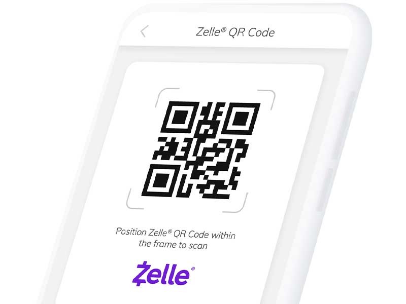 Angled phone with Zelle logo and QR Code on screen